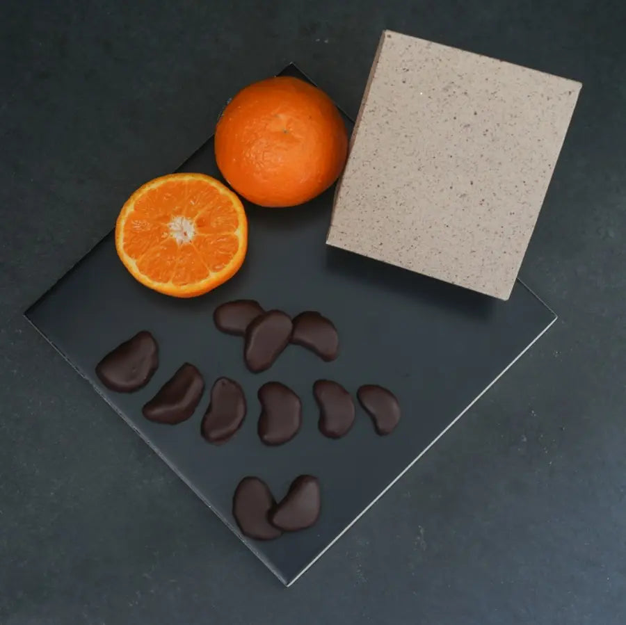 Quartiers de mandarine recouverts de chocolat